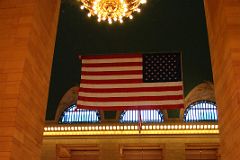 04 New York City Grand Central Terminal Main Concourse Entrance With Chandeliers And American Flag.jpg